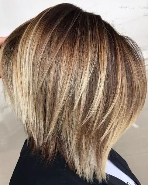 Braune haare mit blonden strähnen,